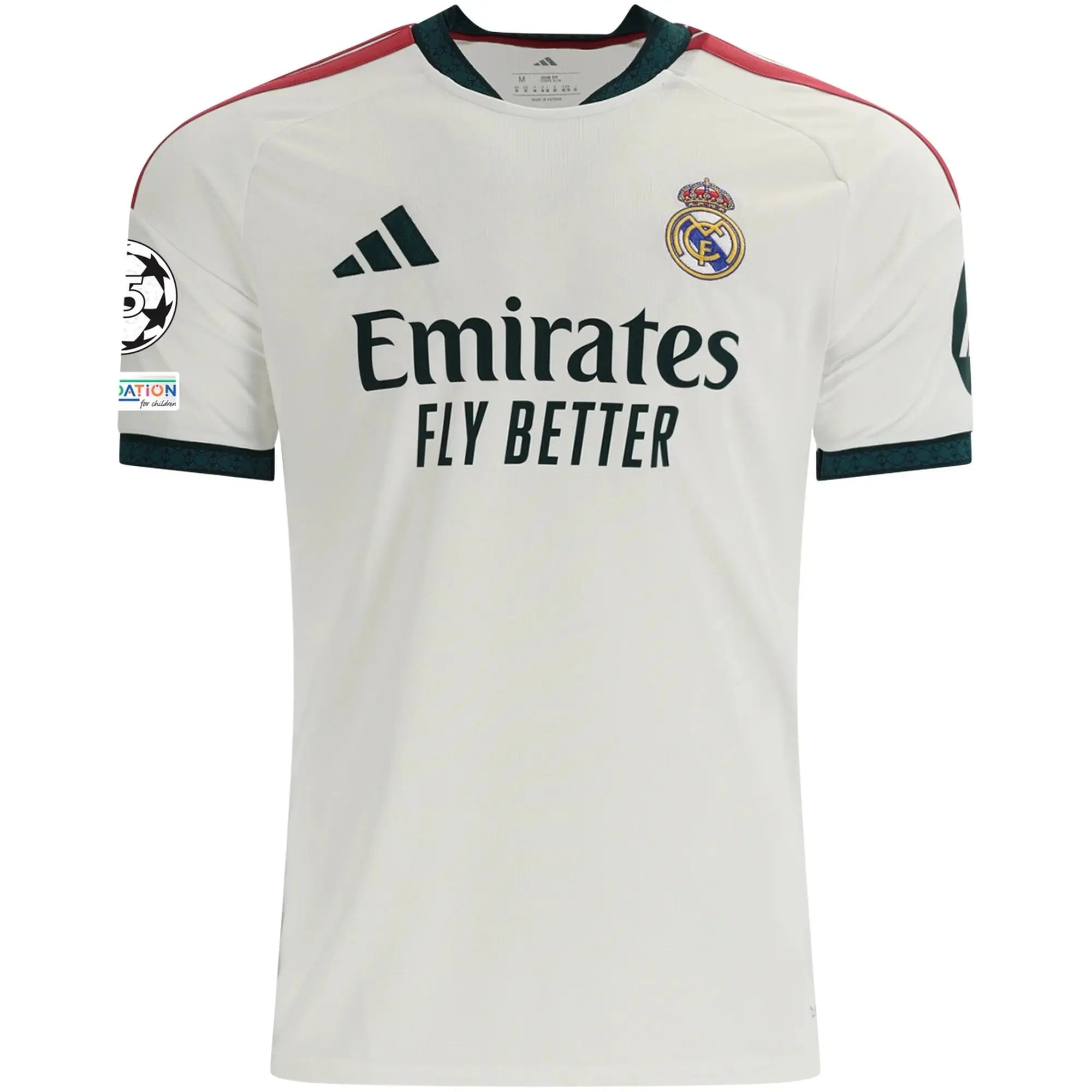 A white Real Madrid soccer jersey by adidas, featuring the club crest on the chest, the adidas logo, Emirates Fly Better sponsor text, and dark green and red shoulder accents.